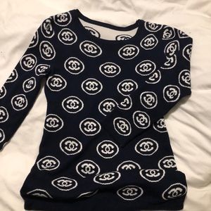 A Chanel logo sweater